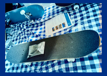 Newly assembled skateboard on table
