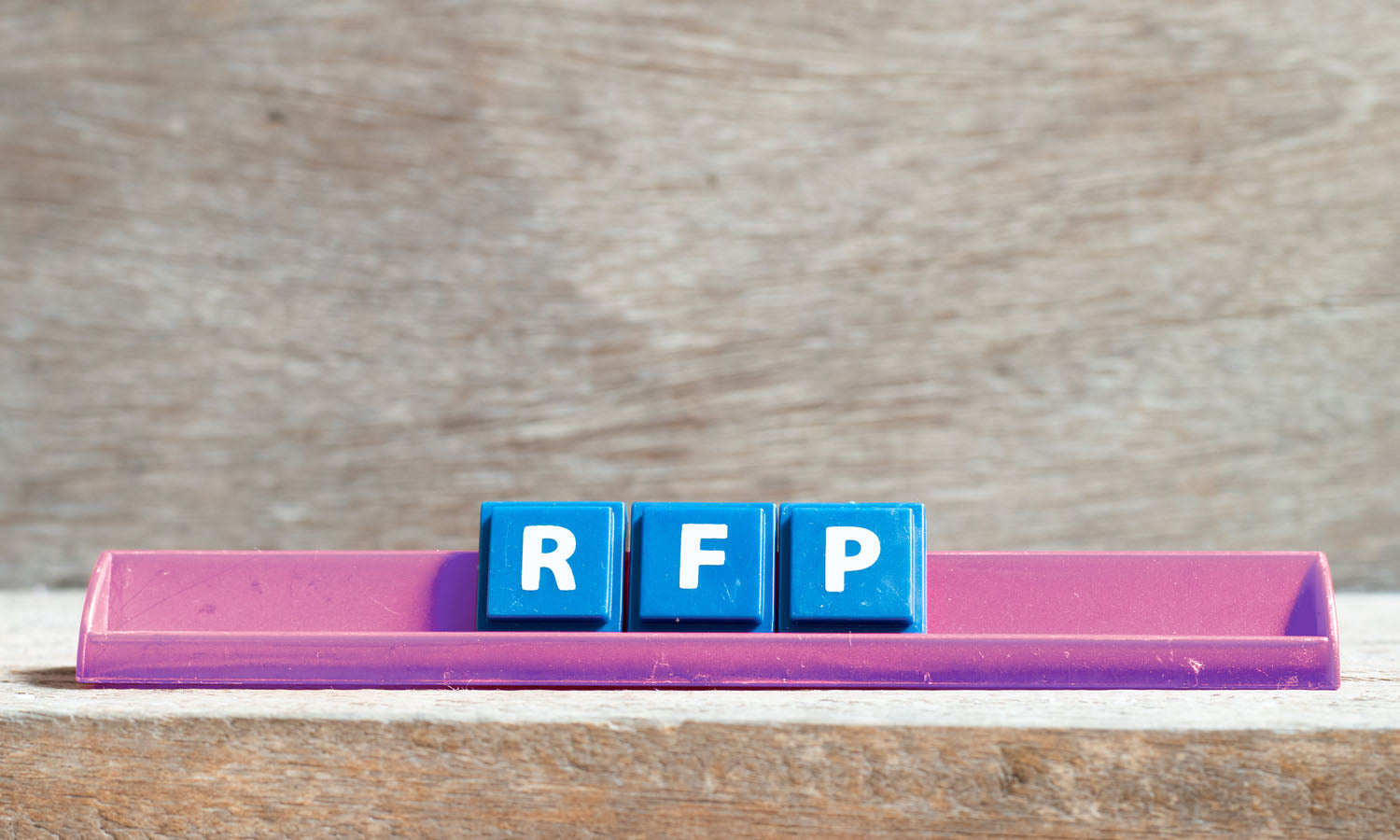 Scrabble-like holder with 3 tiles R, F and P (licensed from Adobe Stock Photos)