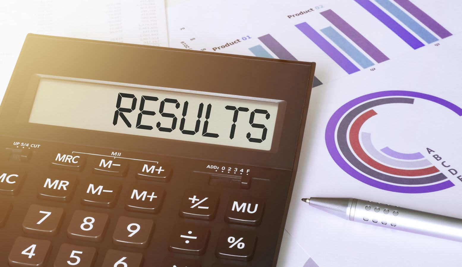 Calculator reading RESULTS and chart with pen (licensed from Adobe Stock Photos)